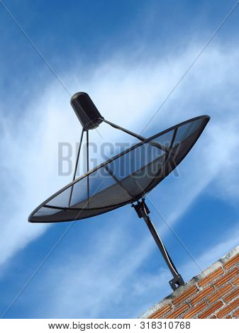 Sattlelite Technology Connect People From Around The World. Sattlelite Dish With Blue Sky Background