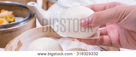 Delicious Dim Sum, Famous Cantonese Food In Asia, Fresh And Hot Salted Creamy Custard Buns In Bamboo
