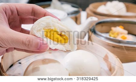 Delicious Dim Sum, Famous Cantonese Food In Asia, Fresh And Hot Salted Creamy Custard Buns In Bamboo