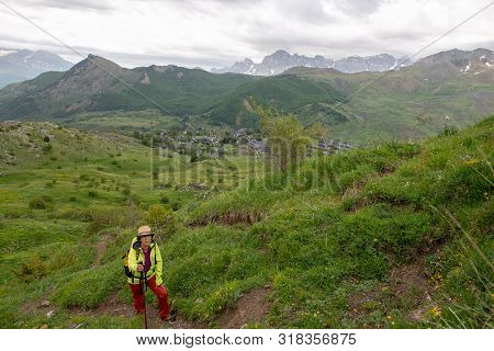 Hiker Woman With A View Of Tena Valley In The Pyrenees, Formigal,  Huesca, Spain