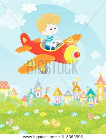 Little Boy Piloting His Small Toy Plane Among White Clouds In Blue Summer Sky Over A Green Park Near