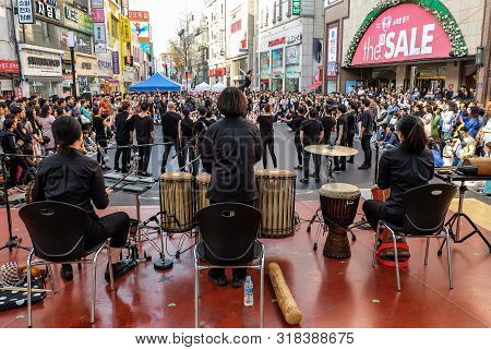 Daegu, South Korea - April 6, 2019 : People Walking At Dongseongno Shopping Street And Watching Spec