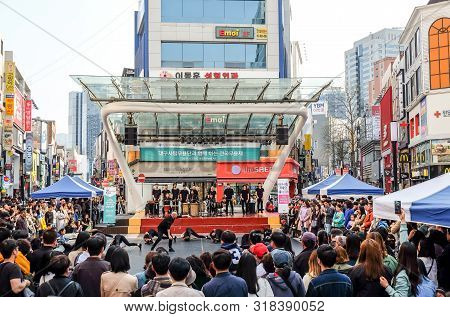 Daegu, South Korea - April 6, 2019 : People Walking At Dongseongno Shopping Street And Watching Spec