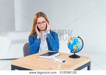 Stressful Young Female Student Has Headache After Hard Studying Day. Overworked Woman Has Headache A