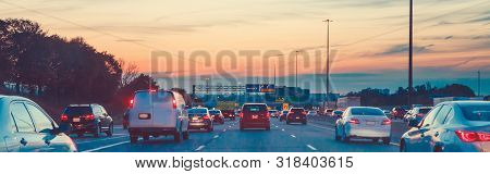 Night Traffic. Cars On Highway Road At Sunset Evening In Busy American City. Beautiful Amazing Urban