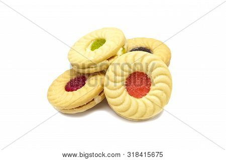 Biscuit Sandwich Butter Cookies With Cream And Mixed Fruits Flavoured Jam. A Stack Of Crunchy Delici