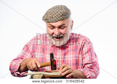 Retro Man Repair Shoes With Hammer. Shoemaker Working With Leather Textile And Hammer At Workshop. S