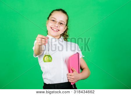 New Ideas For Medicine. Small Smart Girl With Testing Flask. Back To School. Child Study Bilogy Less