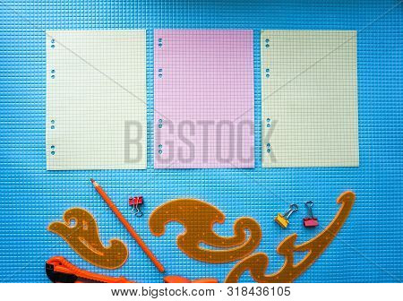 Back To School Concept. Sudent Tools On Blue Background.