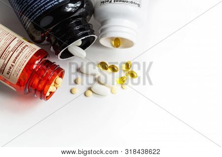 Bottles Of Magnesium, Folic Acid And D3 Vitamin Pills Top View