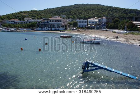 Greece, The Little Island Of Angistri.  Late Season, The Beach Is Quiet. A Sunny Afternoon. Reflecti