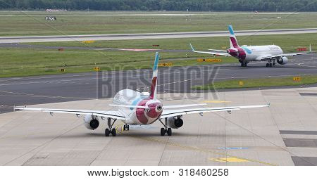 Airplane Taxi In Dusseldorf Airport