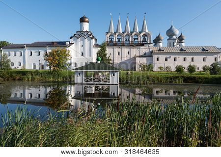 The Bell Tower Of The Tikhvin Assumption (bogorodichny Uspensky)   Monastery With A Reflection In Th