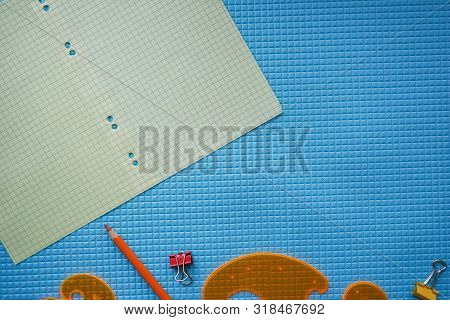 Back To School Concept. Sudent Tools On Blue Background.