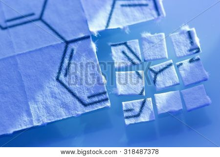 pieces of paper with chemical structures, micro dosing concept