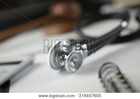 Medical Law Concept.  Gavel And Stethoscope On The Wihte Table.