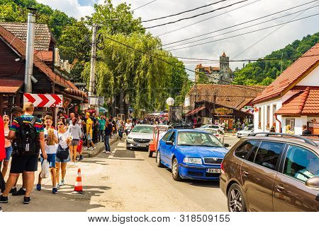 Bran, Romania – 2019. People On Their Way To Bran Castle (castelul Bran). Legendary Historical Castl