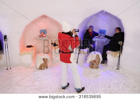 Mayrhofen, Austria - March 13, 2019: People Visit Ahorn White Lounge, A Bar Made Of Ice In Mayrhofen