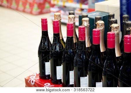 Rows Of Wine Bottles. Wine Bottles In The Store. Copy Space