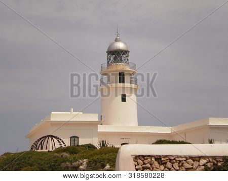 Wonderful Lighthouse Of Cavalleria In Mercadal On The Island Of Menorca. July 5, 2012. Mahon, Menorc