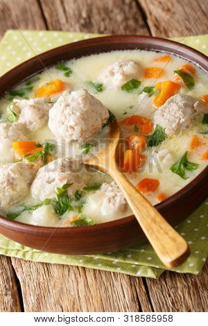 Traditional Bulgarian Soup With Meatballs Close-up In A Bowl. Vertical