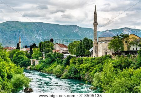 Koski Mehmed Pasha Mosque At The Neretva River In Mostar, Bosnia And Herzegovina