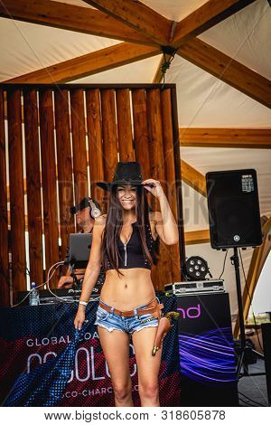 Moscow, Russia - July 27, 2019: Go Go Dance Outdoor. Young And Sexy Woman At Johncalliano Hookah Fes