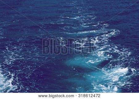 Creative Layout Made Of Clear Sea Watersurface With Kelvou Jet, Bubbles And Waves On Water Surface W