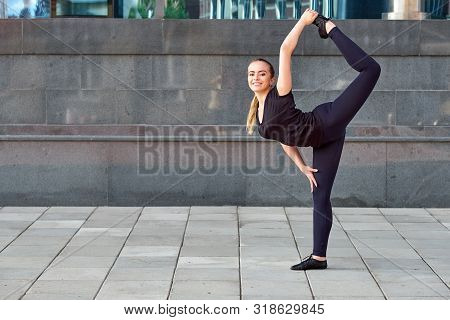 Stretching Fit Or Dancer Or Fitness Woman Doing Exercise