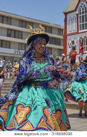 Arica, Chile - February 11, 2017: Members Of A Waca Waca Dance Group In Ornate Costume Performing At