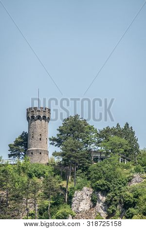 Dinant, Belgium - June 26, 2019: Brown Stone Watch Tower Of Citadelle Fortification Under Blue Sky O