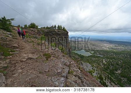 Hikers On The Tam Mcarthur Rim Trail In The Three Sisters Vwilderness Near Sisters, Oregon.
