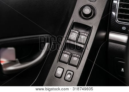 Novosibirsk, Russia - August 01, 2019:   Ssangyong
Actyon, Close-up Of The Side Door Buttons: Window