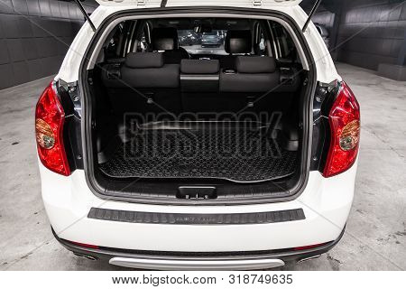 Novosibirsk, Russia - August 01, 2019:   Ssangyong
Actyon, Close-up Of The Open Trunk, Headlight, Bu