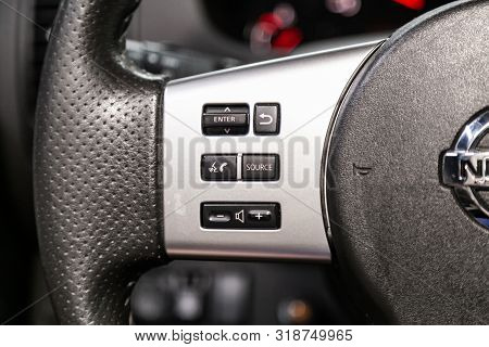 Novosibirsk, Russia - August 01, 2019:  Nissan Pathfinder, Close-up Of The Multiwheel With Phone Set