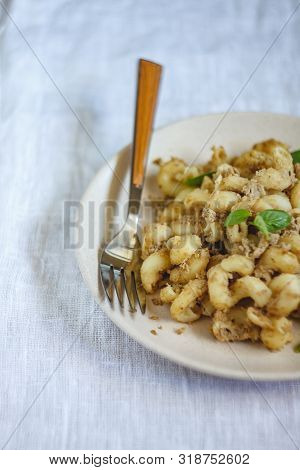 Traditional Soviet Russian Pasta Dish, Vermicelli, Navy Pasta, With Meat On A White Plate On A Light