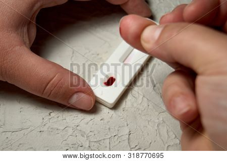 Hiv Self-test Finger With A Drop Of Blood. Hiv Test Express.