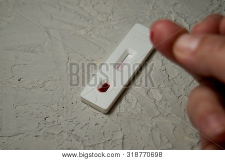Hiv Self-test Finger With A Drop Of Blood. Hiv Test Express.