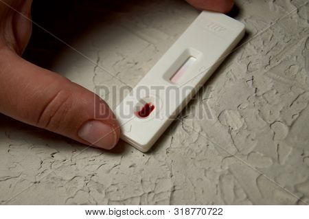 Hiv Self-test With A Drop Of Blood. Hiv Test Express.