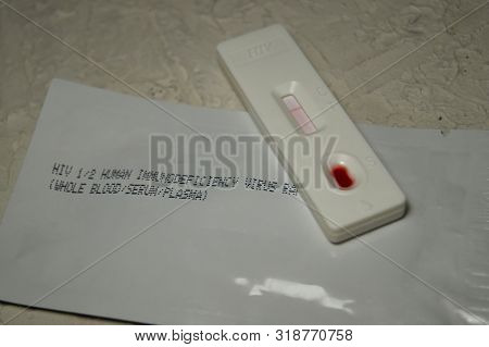 Hiv Self-test With A Drop Of Blood. Hiv Test Express.