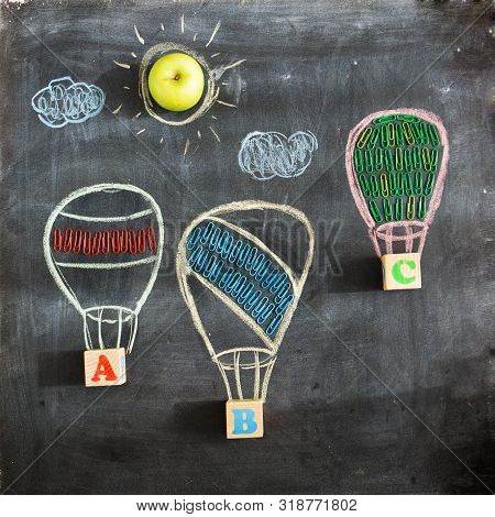 Back To School. Drawing Of Three Balloons Or Aerostats On A School Blackboard With The Letters Abc A