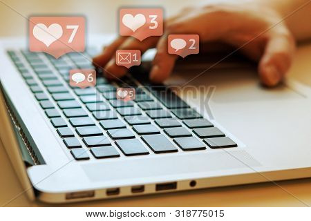 Person is using laptop with black keys, Social media and social networking. Marketing concept. Heart