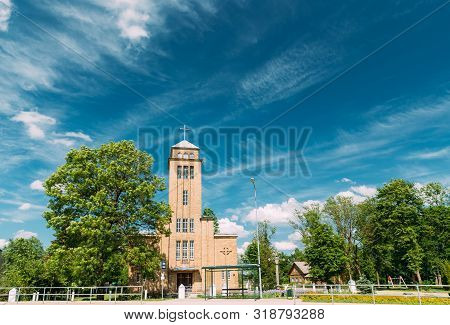 Akniste, Akniste Municipality, Selonia, Latvia. Catholic Church In Sunny Summer Day. Architectural H