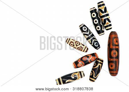 Necklace And Pendant Amulet Dzi Bead Tibet Style Isolated On White Background. Clipping Path