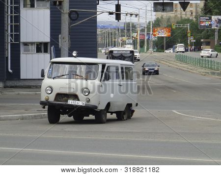 Kazakhstan, Ust-kamenogorsk, August 9, 2019: Car With Broken Wheel (tire). Uaz 452. Traffic. One Of 