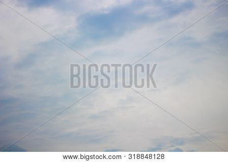 Bright Blue Cloudy Sky With White Cloud