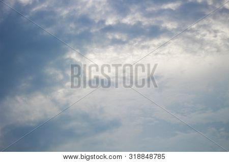 Bright Blue Cloudy Sky With White Cloud