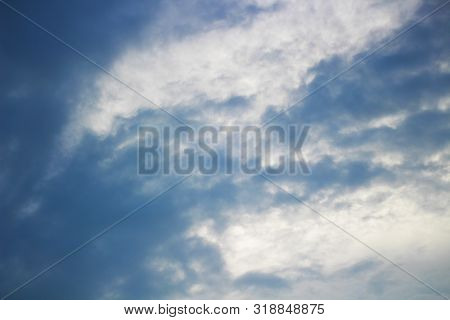 Bright Blue Cloudy Sky With White Cloud