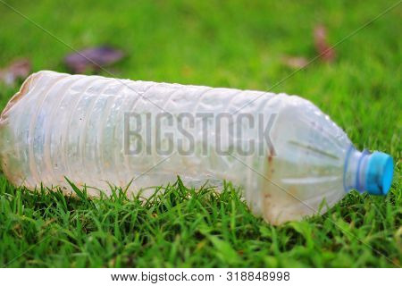 Plastic Pollution - Plastic Bottle Is Fallen Down In The Grass