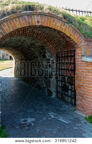Ancient Fortress Gate In The Stone Wall Of The Karela Fortress